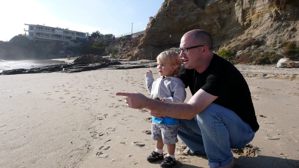 Luke pointing at ocean