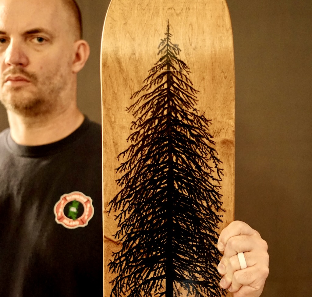 Luke Dorny holding Planted Deck