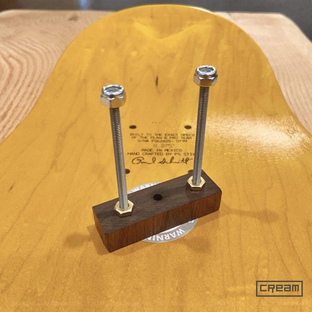 Floating wall hanger hardware, custom cut and coated with Tung Oil for Cream Co