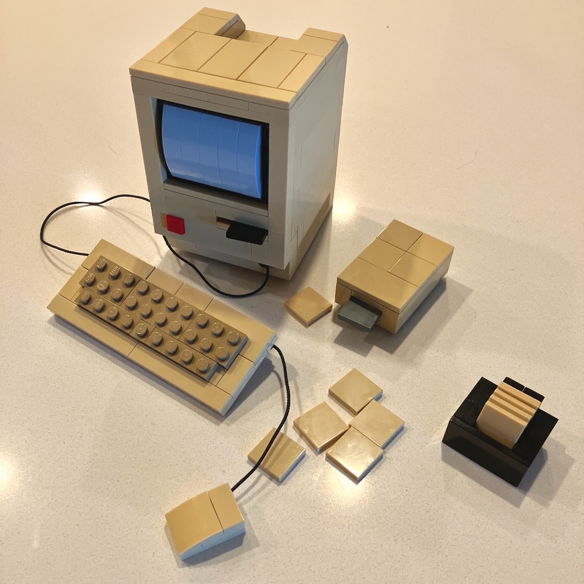 Macintosh with floppy drive and floppies