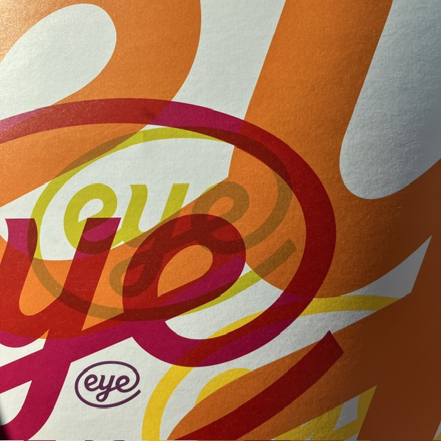 photo of the eye logo graphic on a printed page