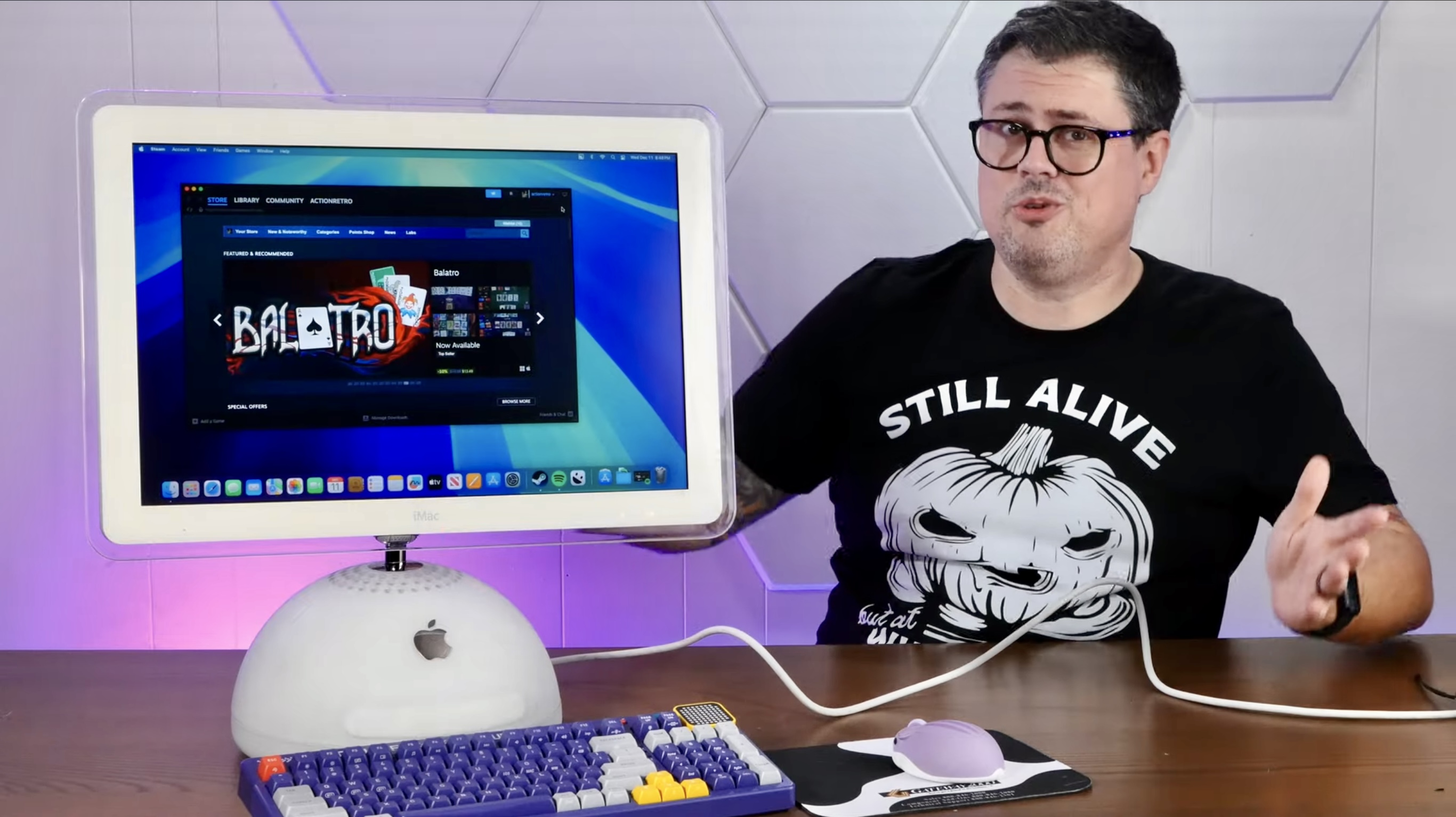 screenshot of YouTube video of Action Retro channel with iMac G4